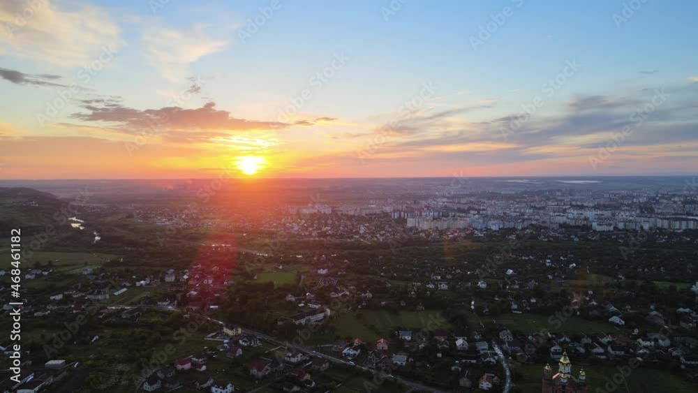 Aerial view of residential houses in suburban rural area at sunset Aerial view of residential houses in suburban rural area at sunset