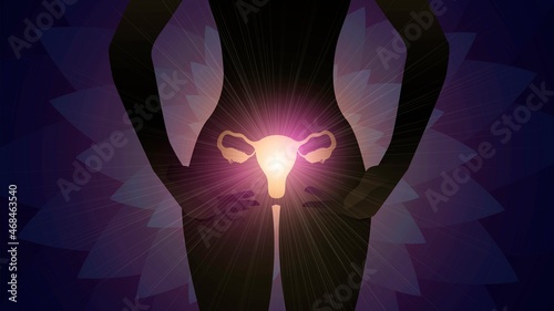 Woman body silhouette with golden glowing uterus, female internal genitals