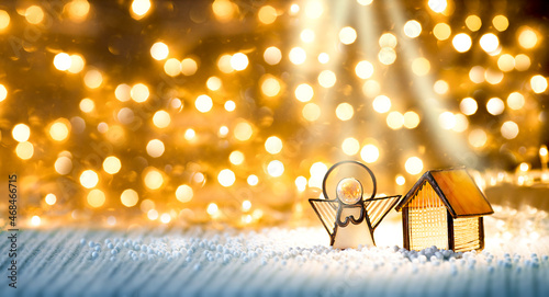 Angel toy on a Christmas background .Christmas card. Christmas decoration.