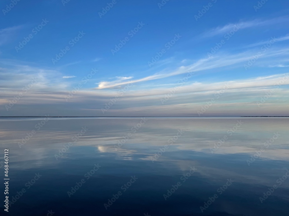 sunset with reflections over bay water sunset with reflections over bay water