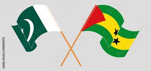 Crossed and waving flags of Pakistan and Sao Tome and Principe