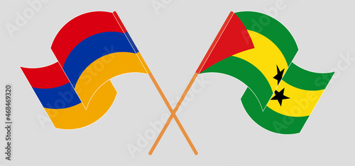 Crossed and waving flags of Armenia and Sao Tome and Principe