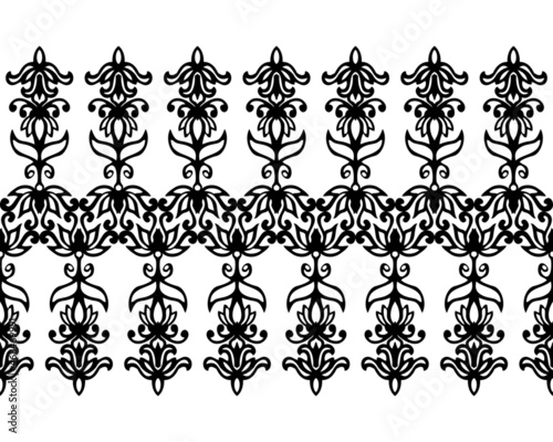 Black and white abstract seamless border with free hand. Floral illustration of leaves, lilies and curls. Design of ribbons and edges.
