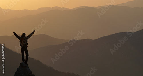 mountaineer enjoying the summit