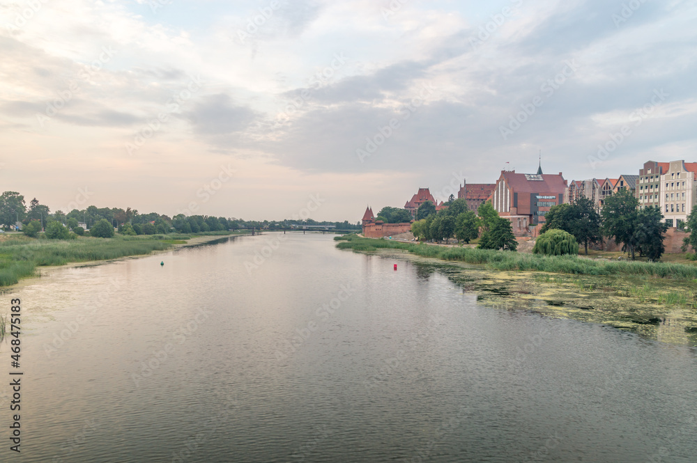 Nogat river at sunset in Malbork, Poland.