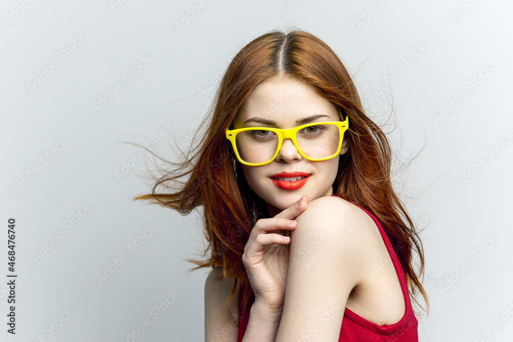 pretty woman yellow glasses hairstyle fashion close-up pretty woman yellow glasses hairstyle fashion close-up