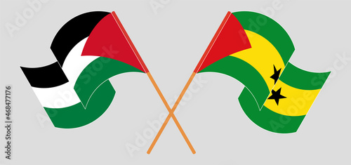 Crossed and waving flags of Palestine and Sao Tome and Principe