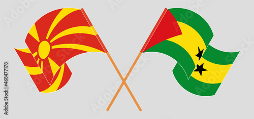 Crossed and waving flags of North Macedonia and Sao Tome and Principe