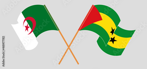 Crossed and waving flags of Algeria and Sao Tome and Principe