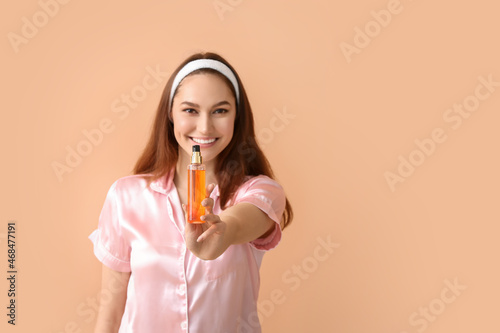 Young happy woman holding s...