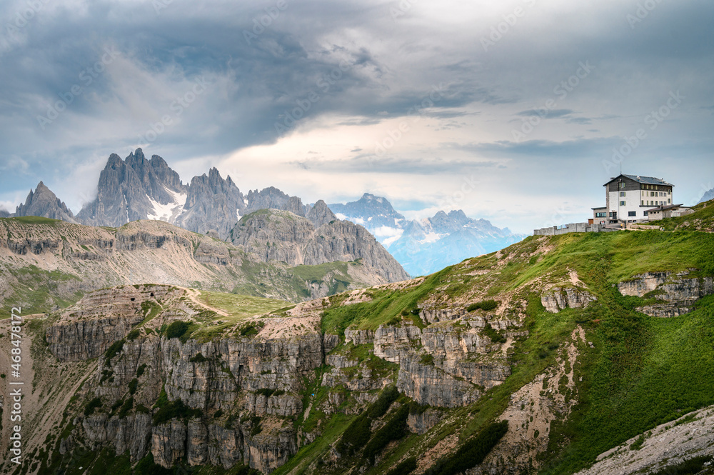 Rescue shelter in Tre Cime Di Lavaredo, Dolomites, Italian alps with mountains in background