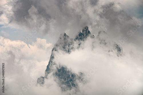 Beautiful closeup view of cloudy Italian Dolomite mountains in Alps during summer day