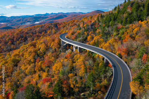 The Blue Ridge Parkway road in North Carolina during the Fall colored trees. photo