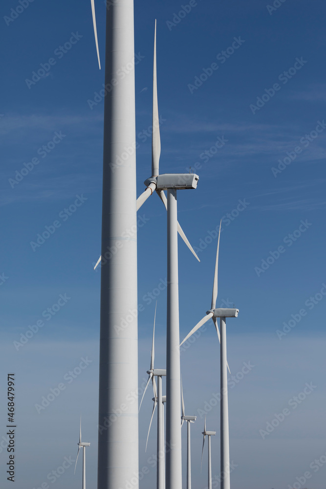 Group of wind turbines, producing renewable energy, in the municipality of Rueda de Jalon, Valdejalon region, Zaragoza province, Aragon, Spain Group of wind turbines, producing renewable energy, in the municipality of Rueda de Jalon, Valdejalon region, Zaragoza province, Aragon, Spain