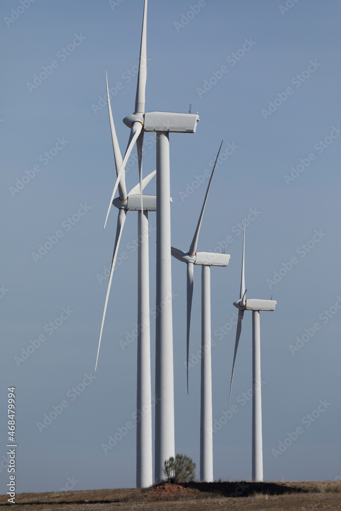 Group of wind turbines, producing renewable energy, in the municipality of Rueda de Jalon, Valdejalon region, Zaragoza province, Aragon, Spain Group of wind turbines, producing renewable energy, in the municipality of Rueda de Jalon, Valdejalon region, Zaragoza province, Aragon, Spain