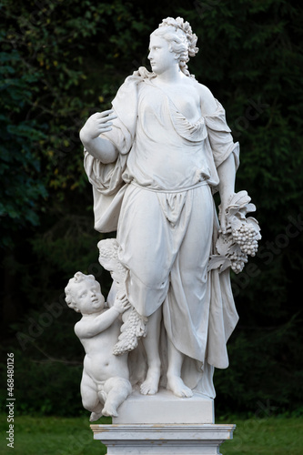 Marble statue of Earth in the garden of Bacchus in the Lower Park, Saint Petersburg, Russia