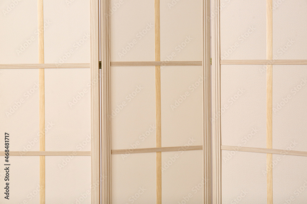 Stylish folding screen background, closeup Stylish folding screen background, closeup