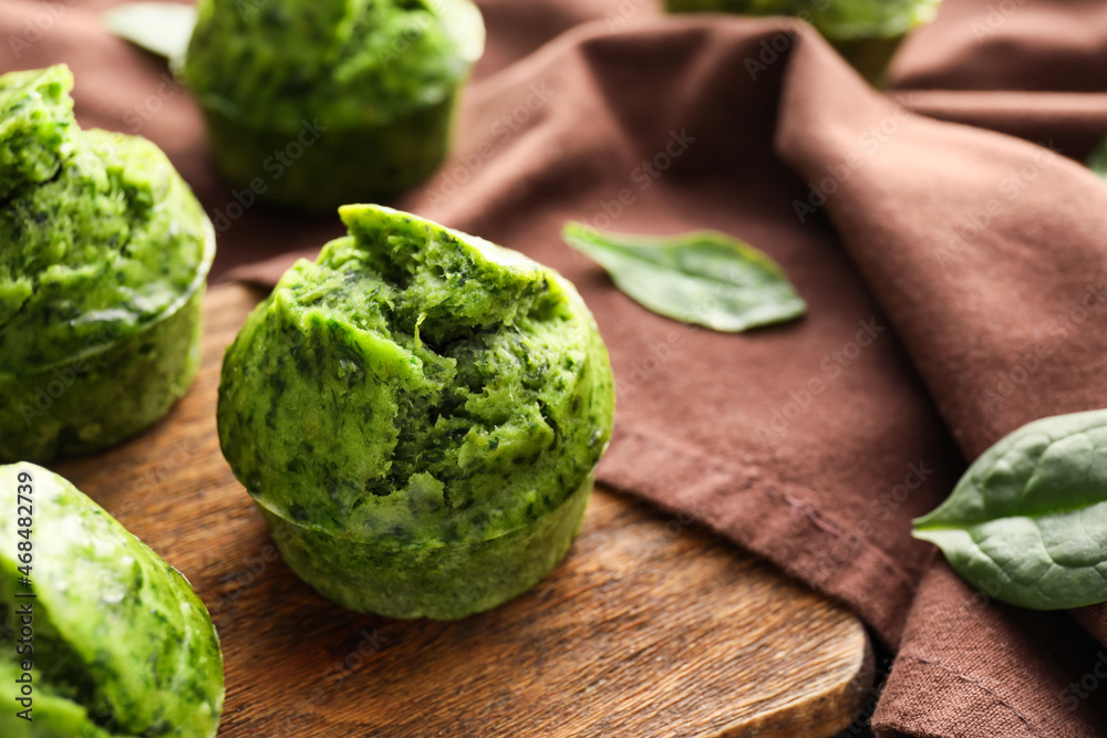 Fototapeta premium Tasty spinach muffins on table, closeup
