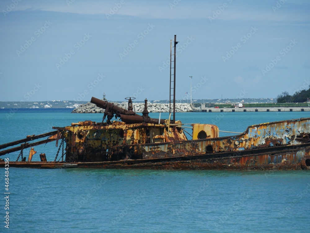 Rusty remnants of an old vessel docked at Georgetown, Great Exumas in the Bahamas.
