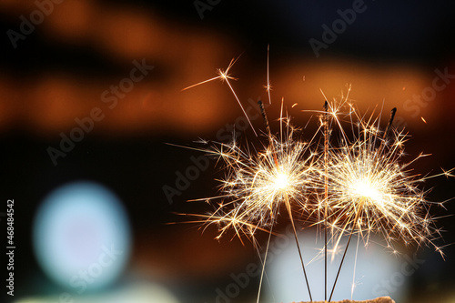 Beautiful sparklers at night outdoors photo