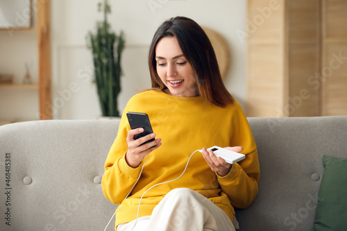 Young woman with phone and ...