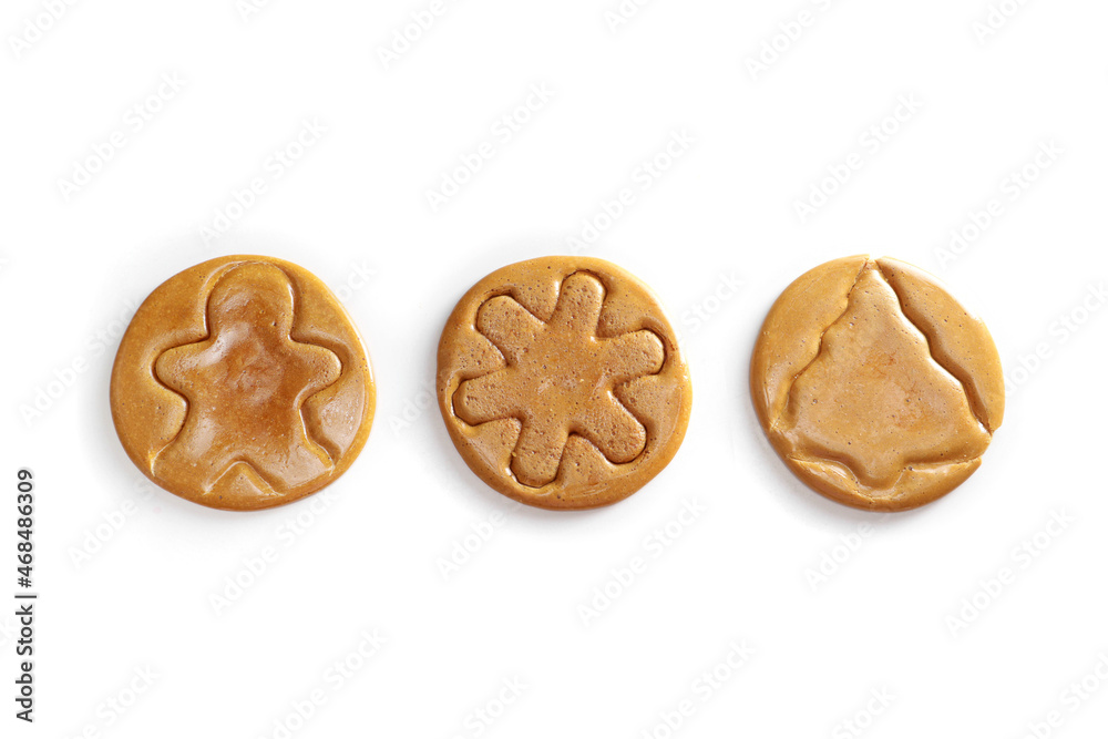 Dalgona candy sugar lollipops isolated on a white background top view, christmas and new year concept Dalgona candy sugar lollipops isolated on a white background top view, christmas and new year concept