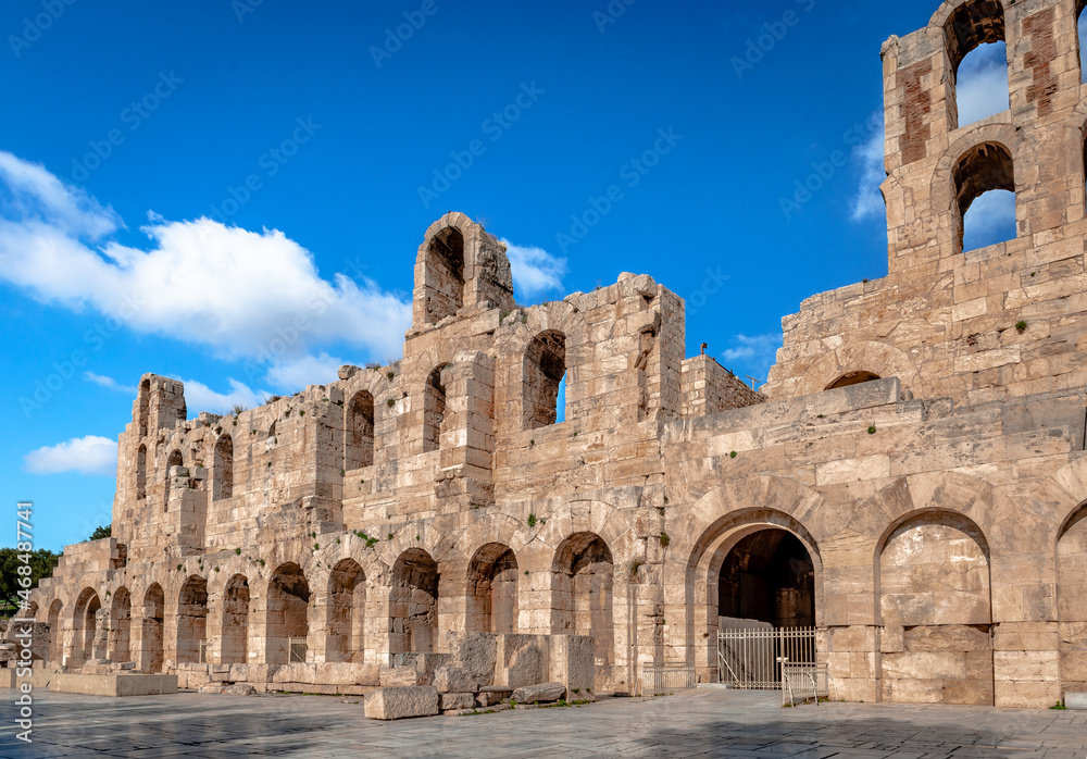 The facade of the Odeon of Herodes Atticus, in Athens, Greece. It is an ancient stone theatre, built in 161 AD, located on the southwest slope of the Acropolis of Athens.