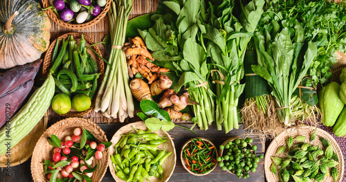 Fresh organic Southeast Asian vegetables and spices from local farmer market, Northern of Thailand, Sustainability concept, Table top view © nungning20