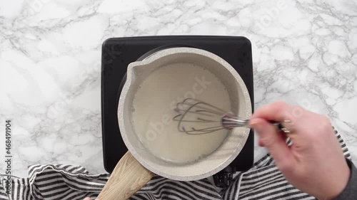 Flat lay. Step by step. Preparing tangzhong in a small saucepan to bake homemade bread. photo