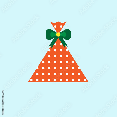 Gift in dotted wrapping paper with green ribbon (ID: 468492796)