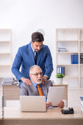 Two colleagues working in the office