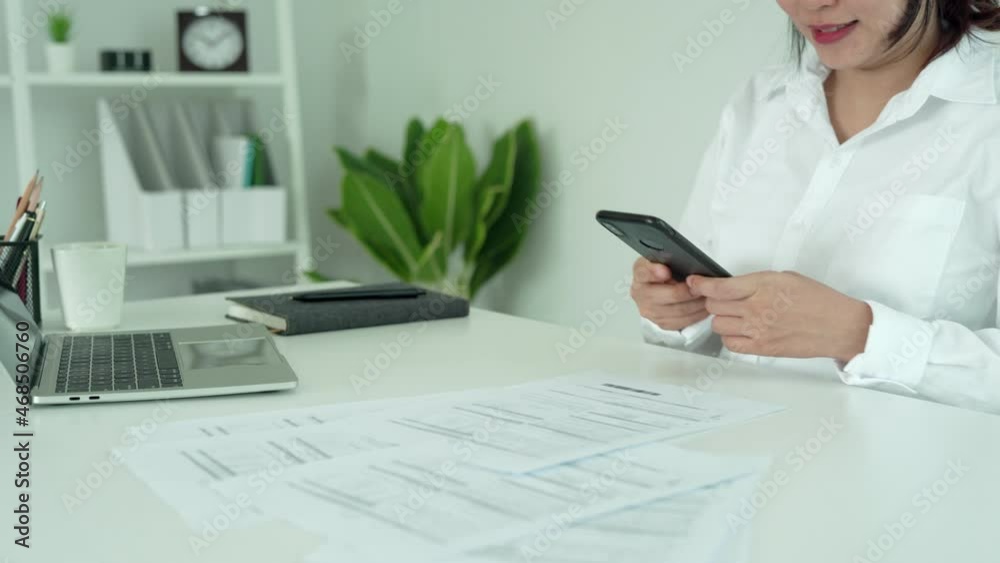woman smile during scan for pay online. Business woman using a mobile ...