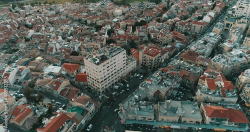 Jerusalem, Israel. Aerial View of Urban Neighborhood Around Shuk Machane Yehuda Market, Tilt Down Drone Shot photo