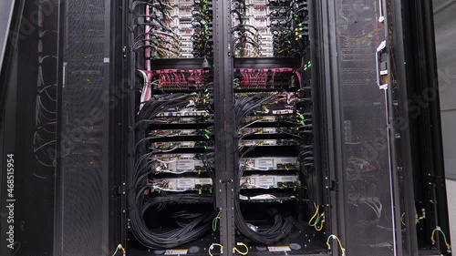 The server room has a lot of wires.	