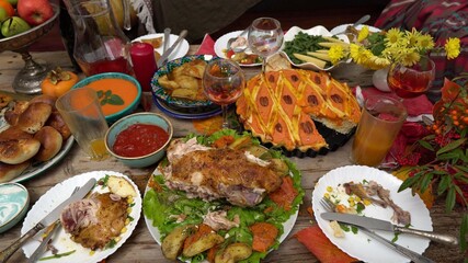 Thanksgiving Leftovers. Uneaten meals on the festive table. Family Dinner Loss. Food and drink waste. Throwing holiday leftovers in the trash