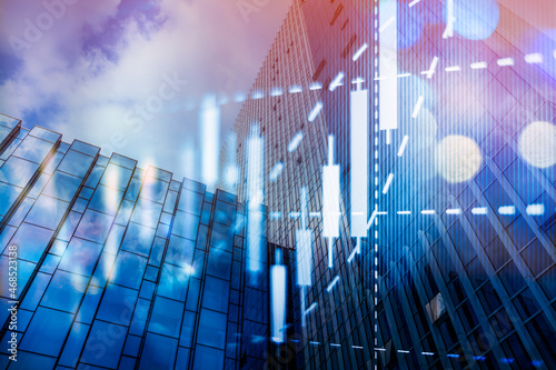 Double exposure of abstract financial chart on office buildings background, research and analytics concept photo