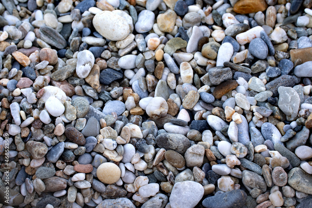 Real natural background: pile of shingles. Grey, brown and white pebbles. Real natural background: pile of shingles. Grey, brown and white pebbles.