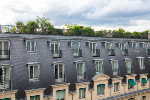 Paris, typical building with a large roof terrace, aerial view in a luxurious area  © Pascale Gueret