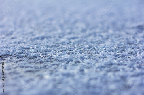 Hoarfrost texture on frozen ice