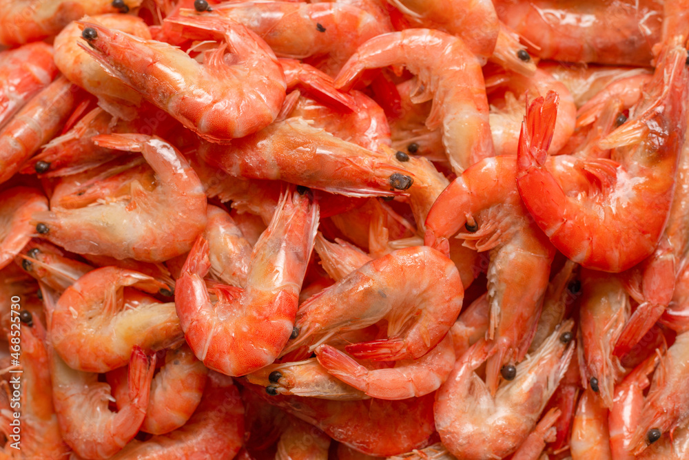 Shrimps background texture. A lot of shrimps. Cooked shrimps.