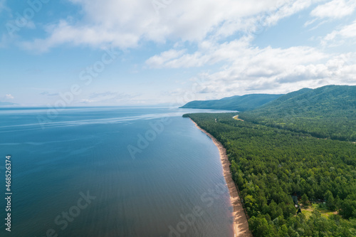 Wallpaper Mural Summertime imagery of Lake Baikal is a rift lake located in southern Siberia, Russia Baikal lake summer landscape view from a cliff near Grandma's Bay. Drone's Eye View. Torontodigital.ca