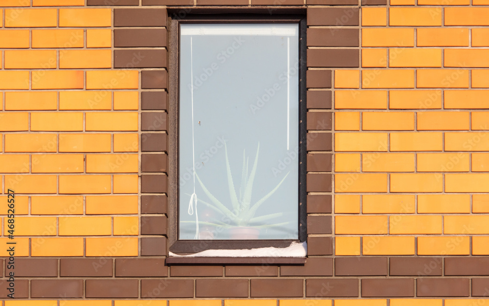 Window in a brick wall of a house Window in a brick wall of a house