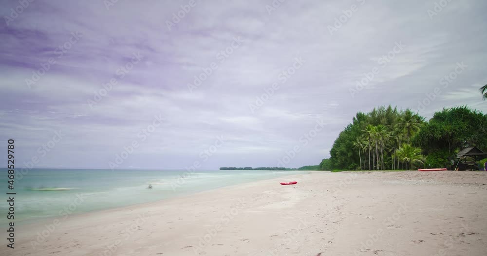 timelapse the beach with white sand and wave from peaceful sea in sunshine daytime timelapse the beach with white sand and wave from peaceful sea in sunshine daytime