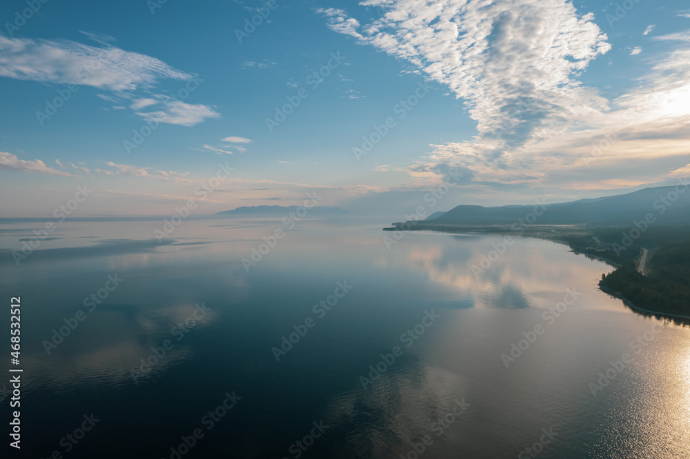 Summertime imagery of Lake Baikal in morning is a rift lake located in southern Siberia, Russia. Baikal lake summer landscape view. Drone's Eye View.