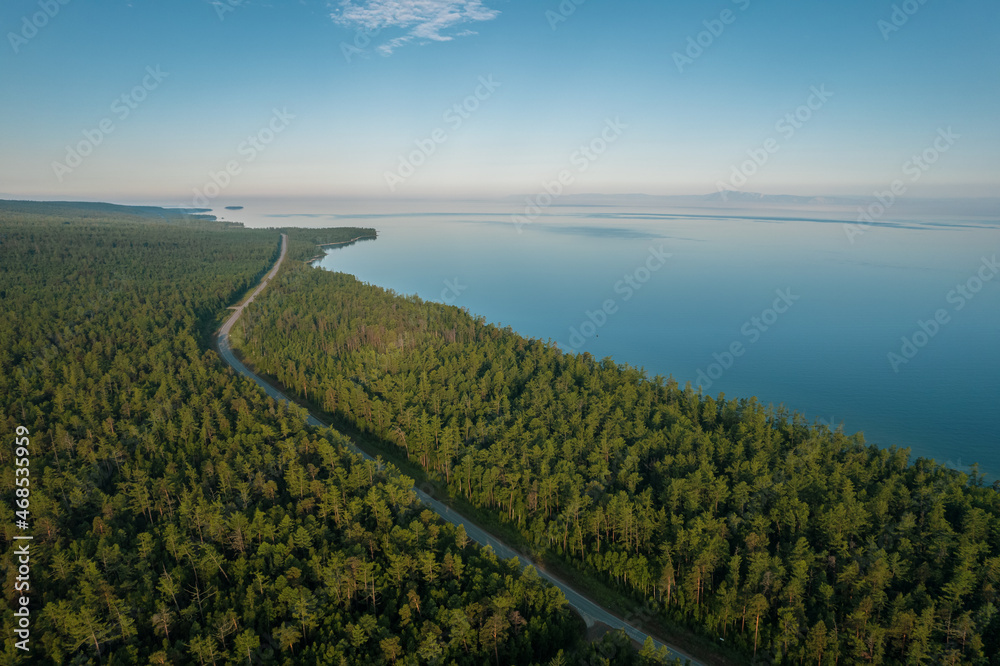 Summertime imagery of Lake Baikal in morning is a rift lake located in southern Siberia, Russia. Baikal lake summer landscape view. Drone's Eye View.