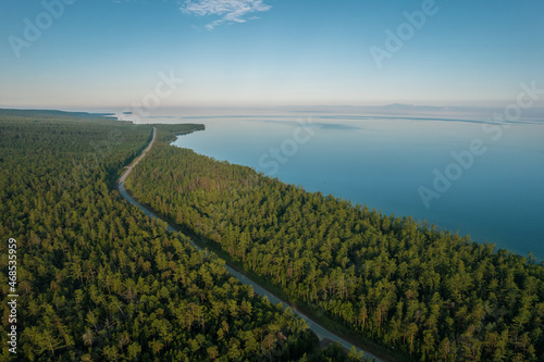Summertime imagery of Lake Baikal in morning is a rift lake located in southern Siberia  Russia. Baikal lake summer landscape view. Drone s Eye View.