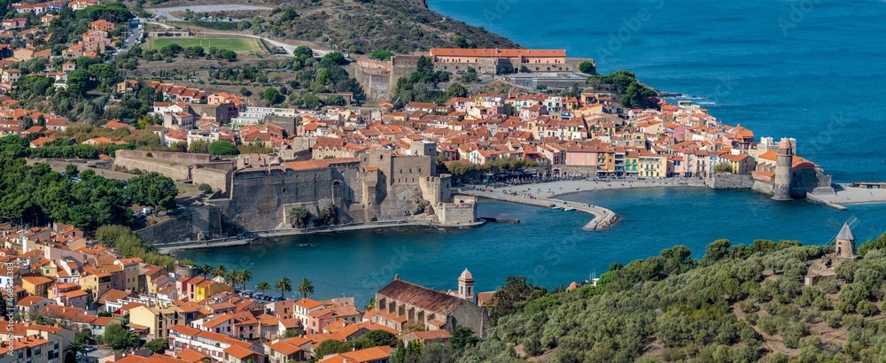 Old town of Collioure, France, a popular resort town on Mediterranean sea, view of the habor and church. High quality photo