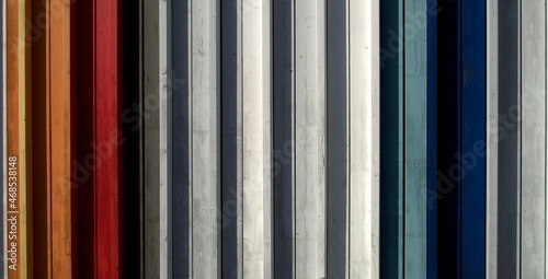 Multicolored wooden wall with shadows