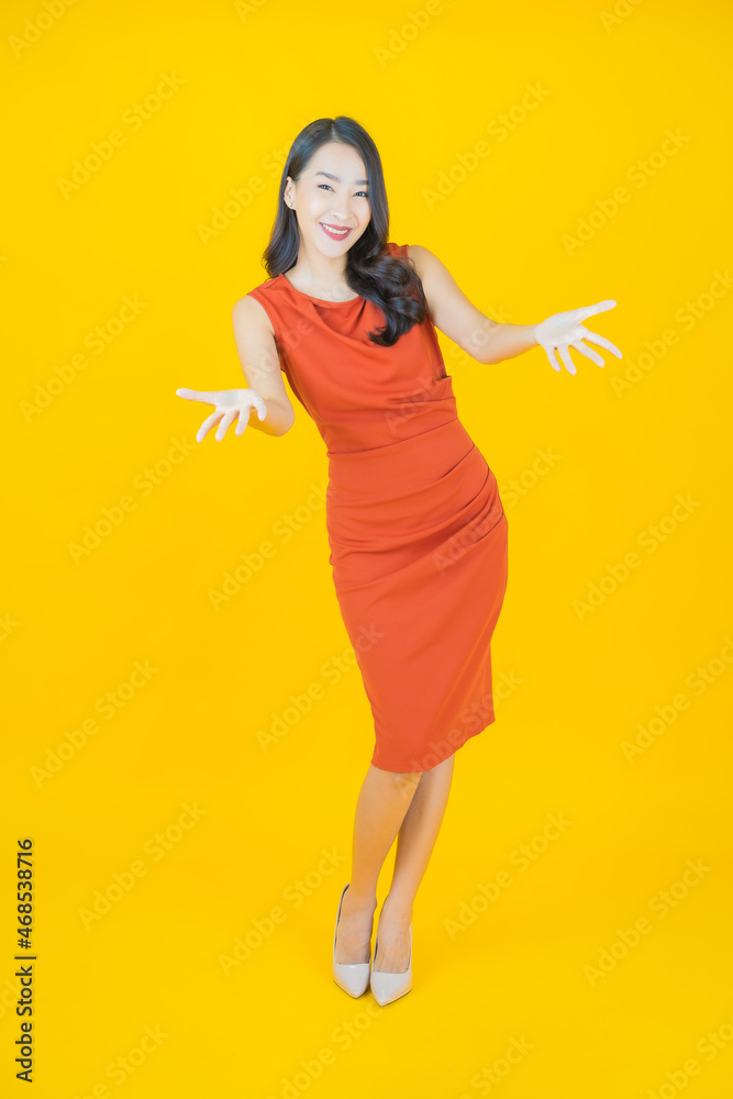 Portrait beautiful young asian woman smile with action Portrait beautiful young asian woman smile with action