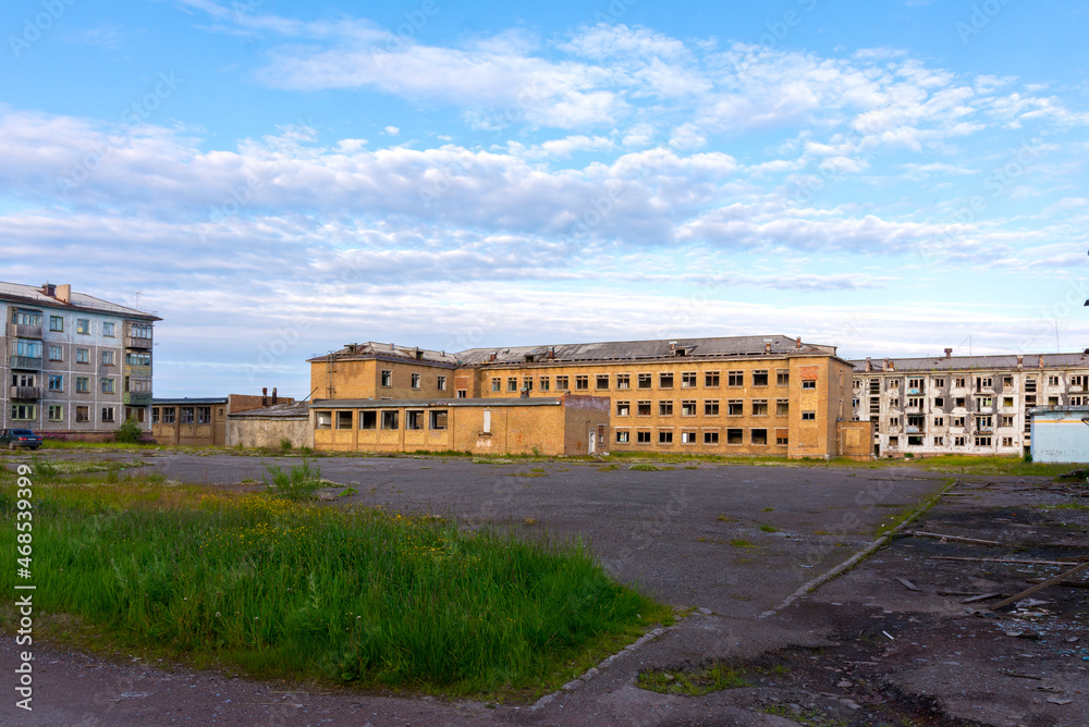 Deserted streets of an abandoned settlement. Abandoned school. Vorkuta.